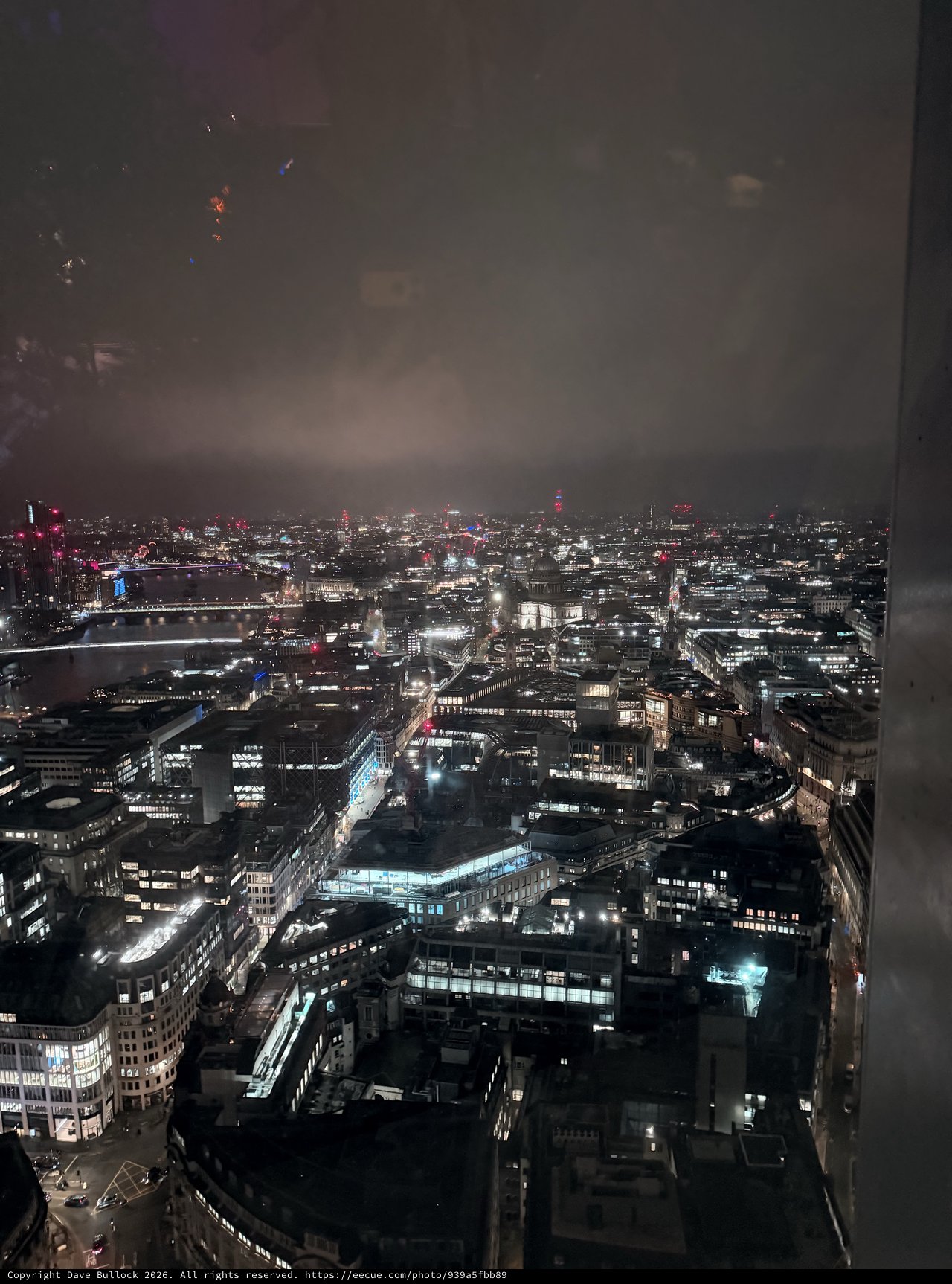 London Cityscape at Night with Fireworks Display