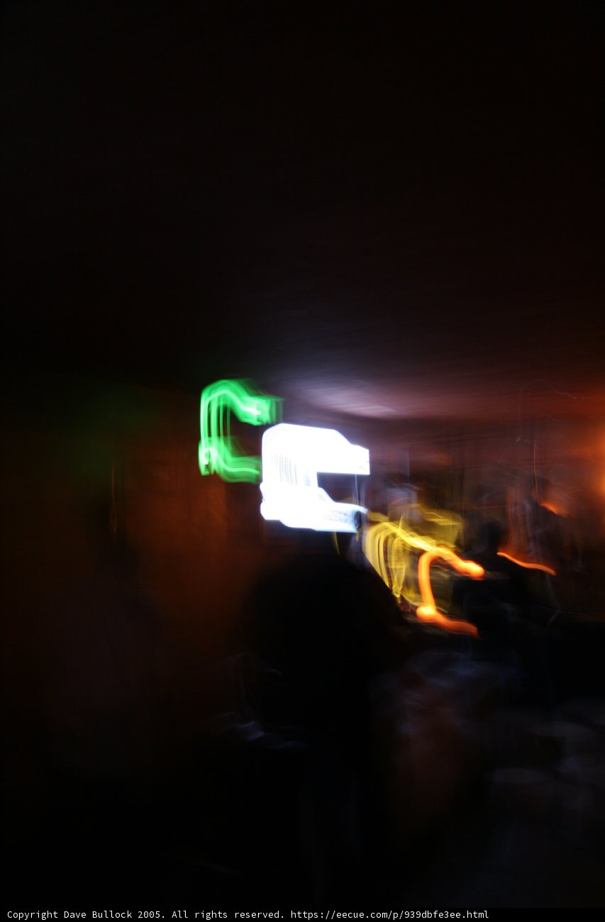Neon Flares Enveloping People in Obscurity