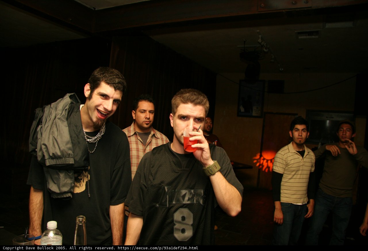 Black-Shirted Man Enjoying a Night Out