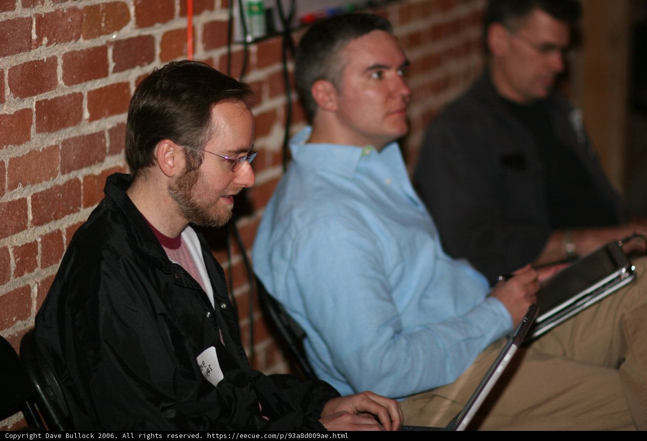 Man Working on Laptop in Barcamp Session