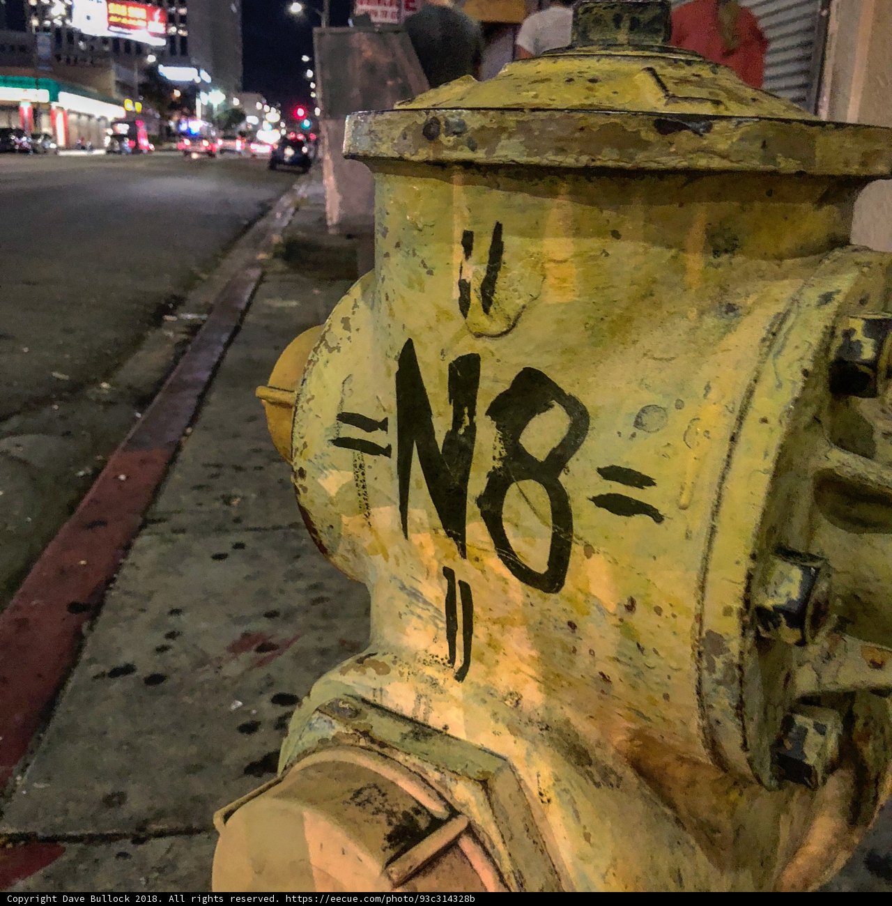 Graffiti on a Yellow Fire Hydrant