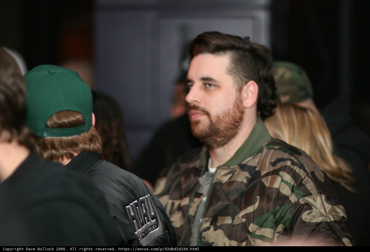 Bearded Man Stands Out in Crowd