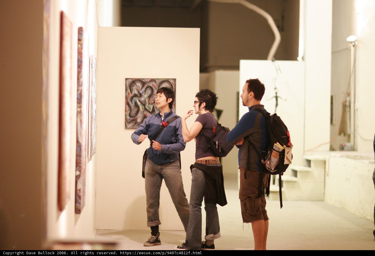 Admiring Art at the Gallery