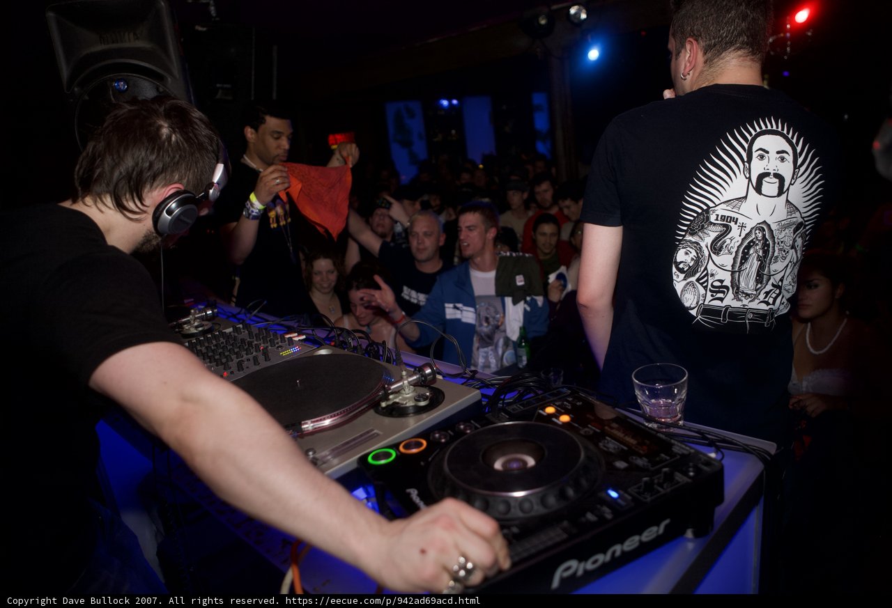 DJ pumps up the crowd at a nightclub