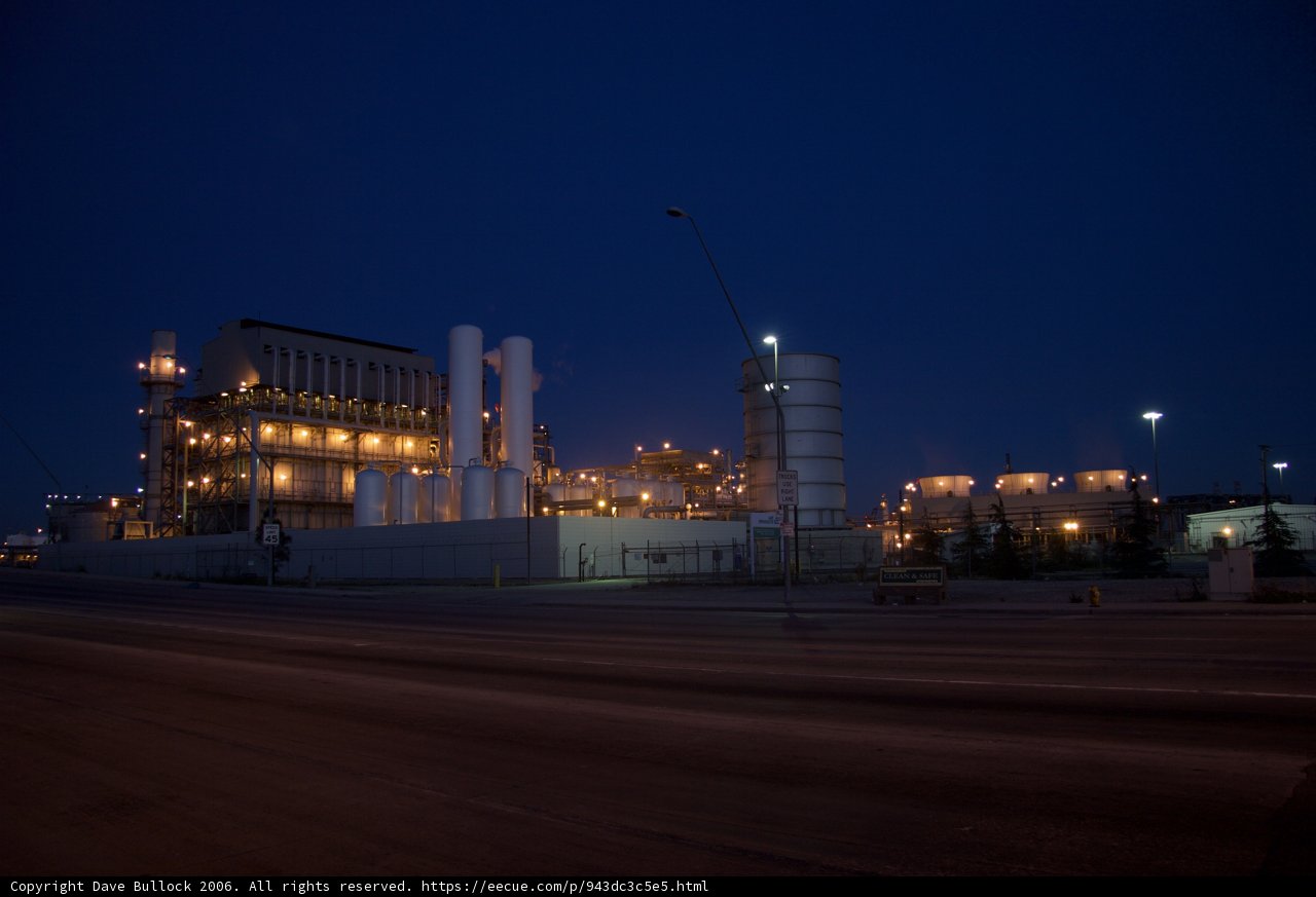 Illuminated Power Plant at Night