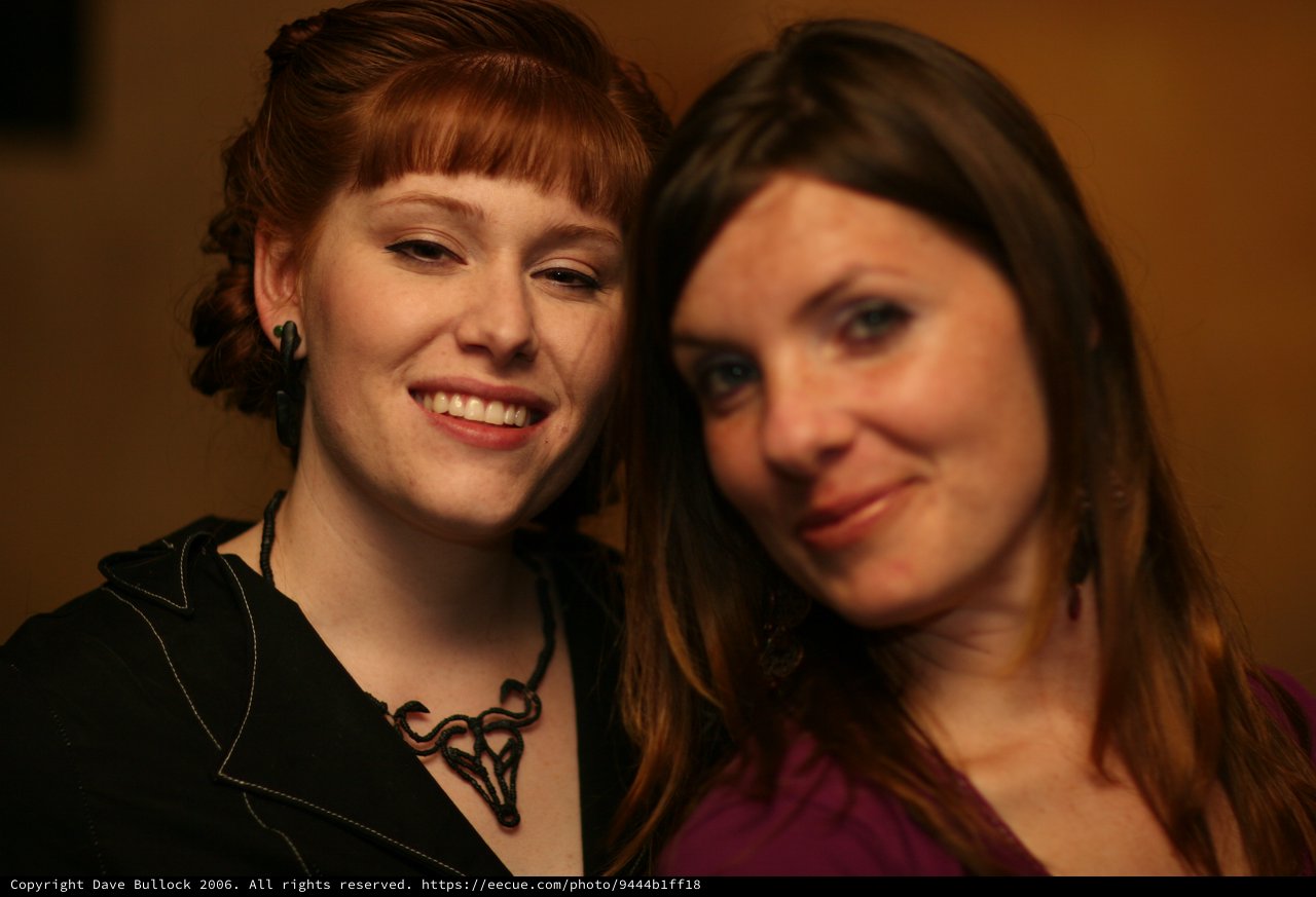 Two Smiling Women Share a Warm Moment Together