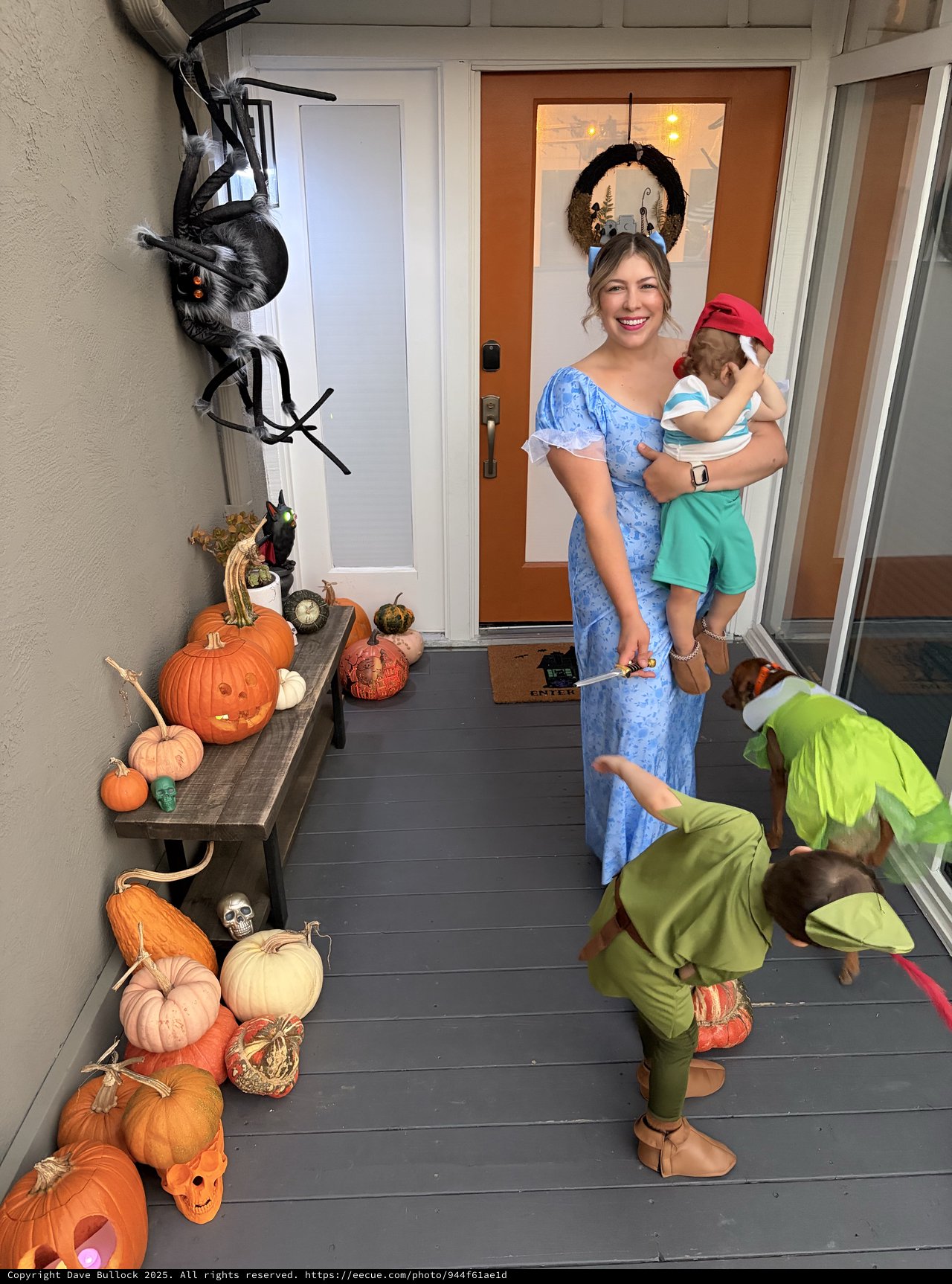 Family Halloween Celebration on Decorated Front Porch