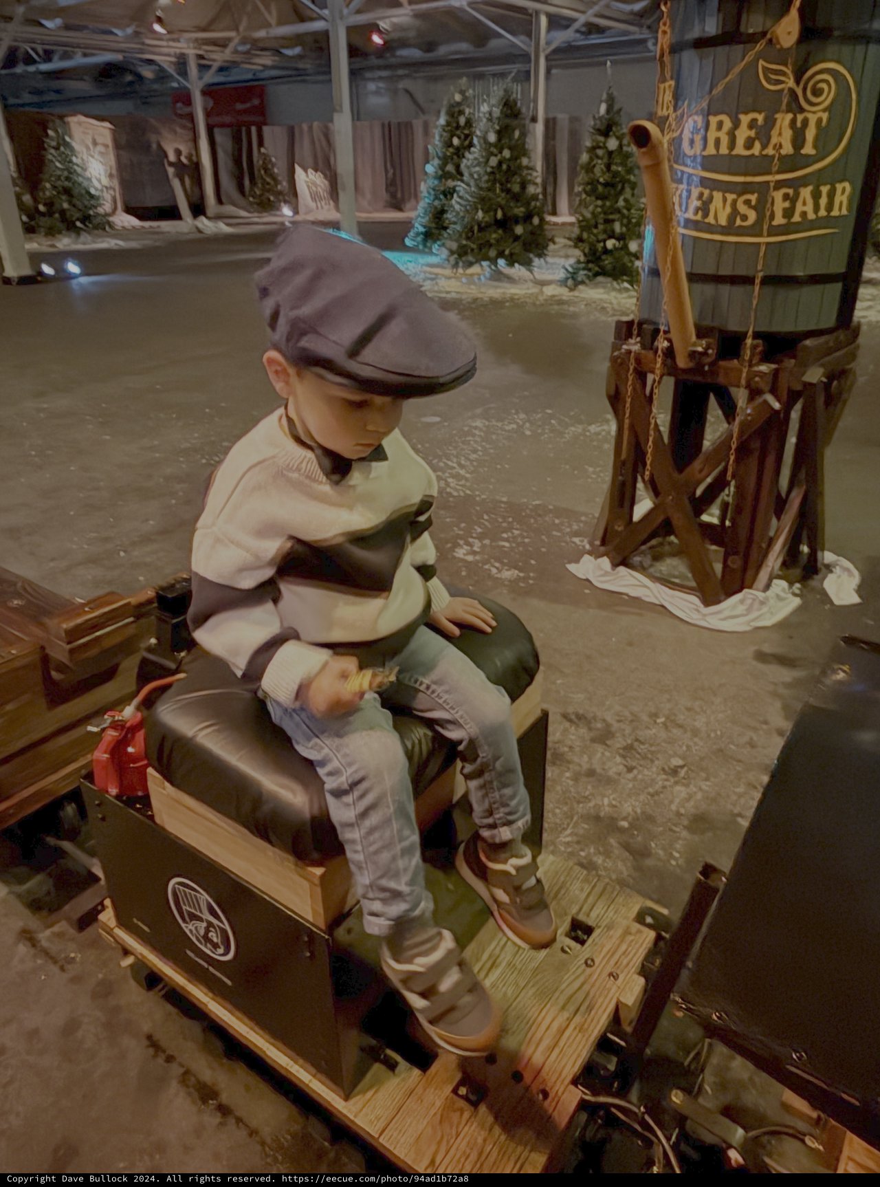 Child Operating Vintage Shoeshine Machine at Fair