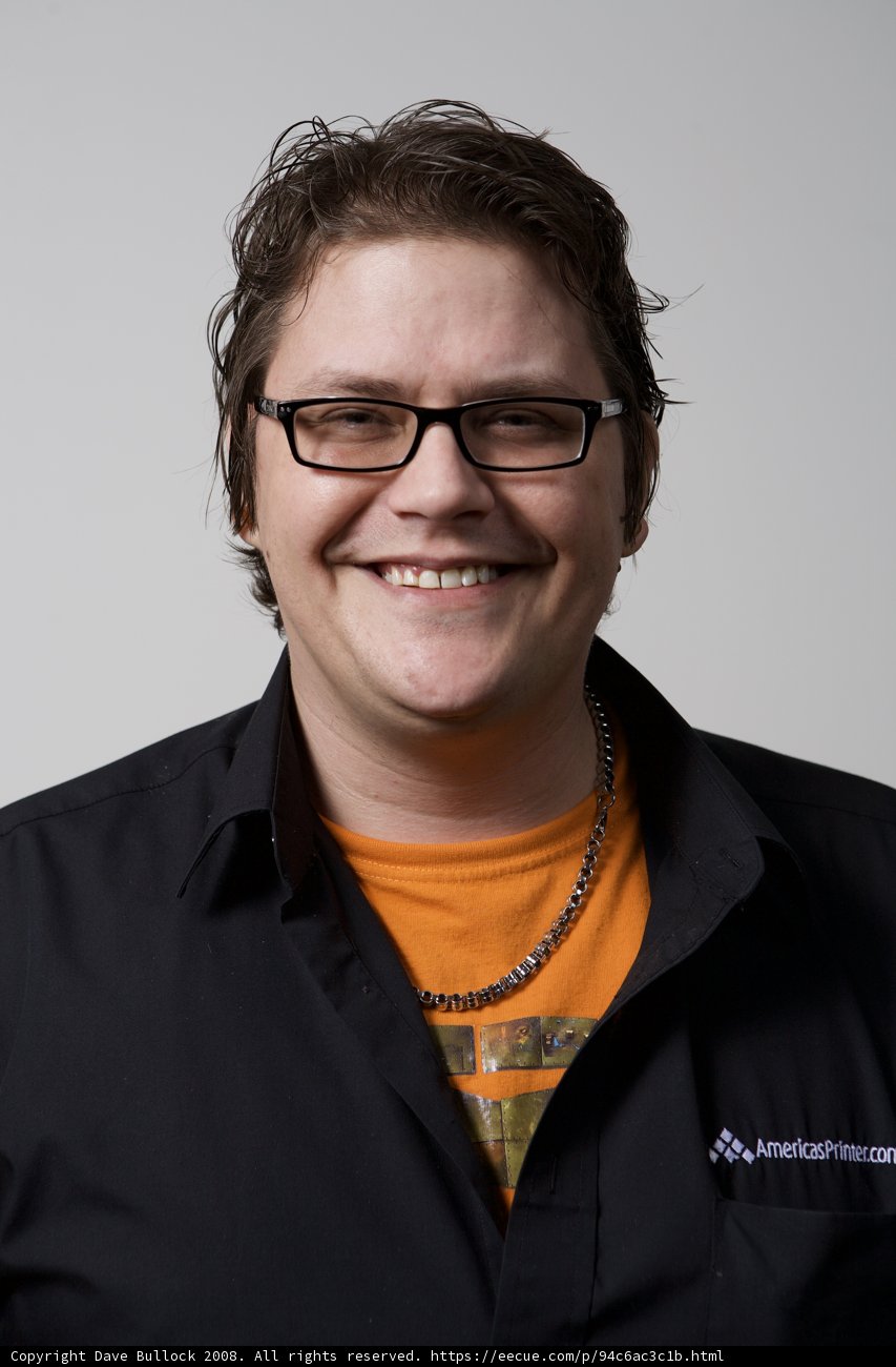 Happy Man in Glasses and Black Shirt