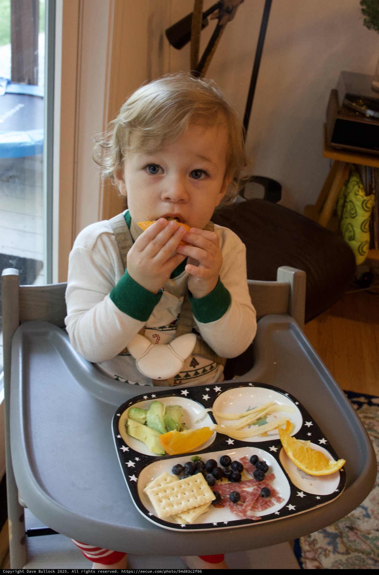 Toddler Enjoying a Healthy Snack at Home