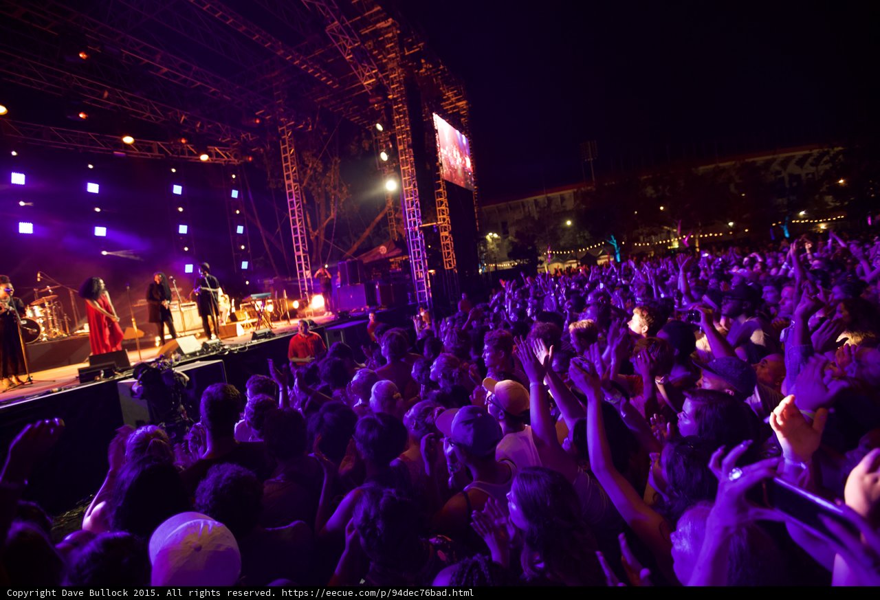 Solange Stage Wide Shot Red Dress Band Crowd Scaffolding Coliseum