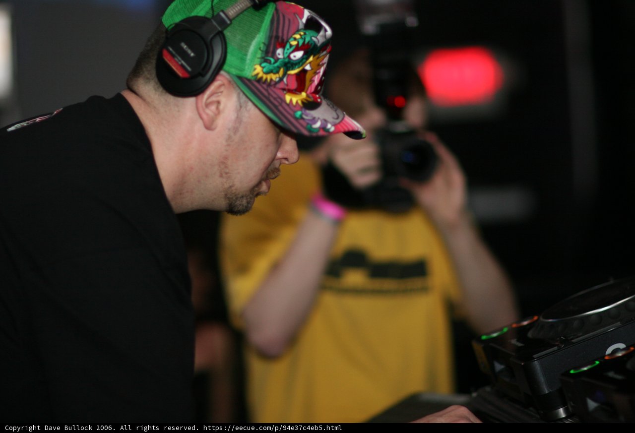 Entertainer in black baseball cap