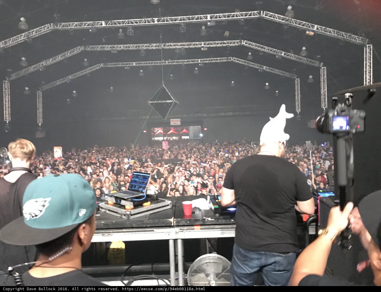 Energy-Fueled Crowd Riled Up by DJ's Electrifying Performance