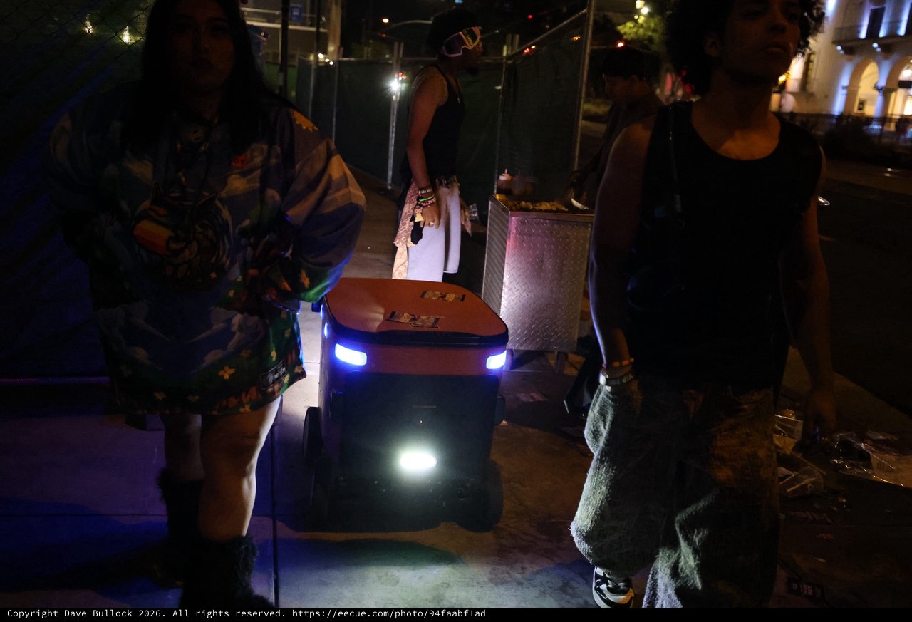 Autonomous Delivery Robot Navigates Night Festival Crowd