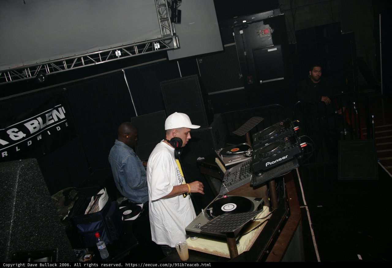 Dj S Playing a Set in a White Hat