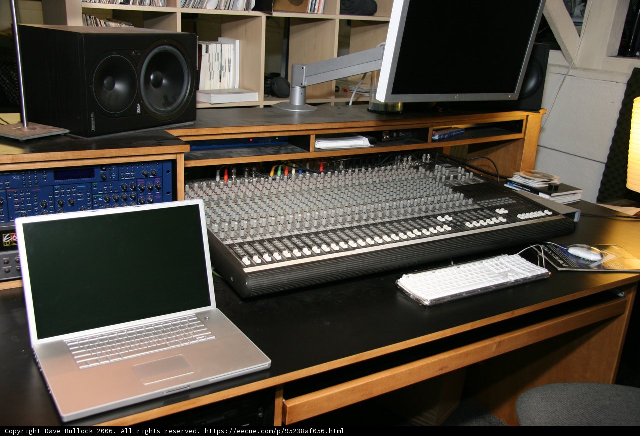 Black Desk Loaded with Computer Hardware and Speakers
