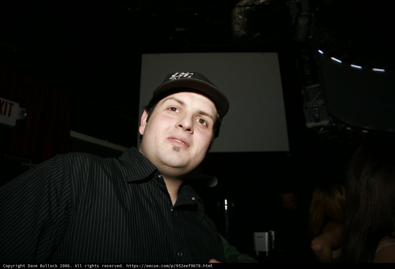 Party Goer in Black Cap