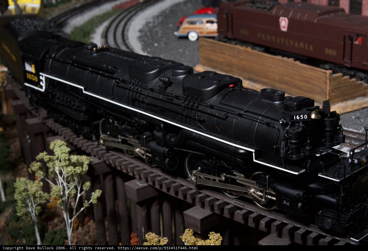 Black Locomotive Amongst Other Trains at Train Museum