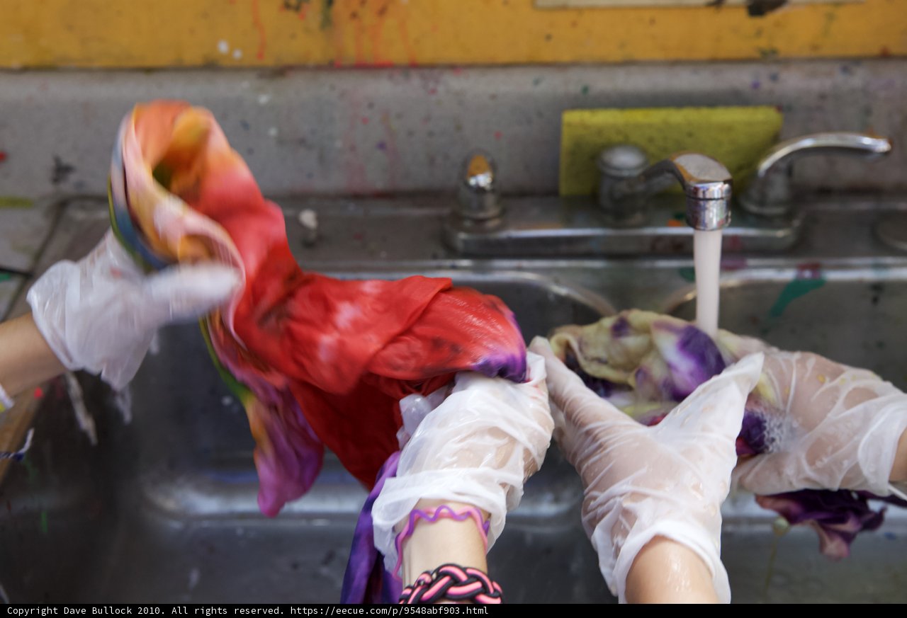 Gloved Hands at the Kitchen Sink