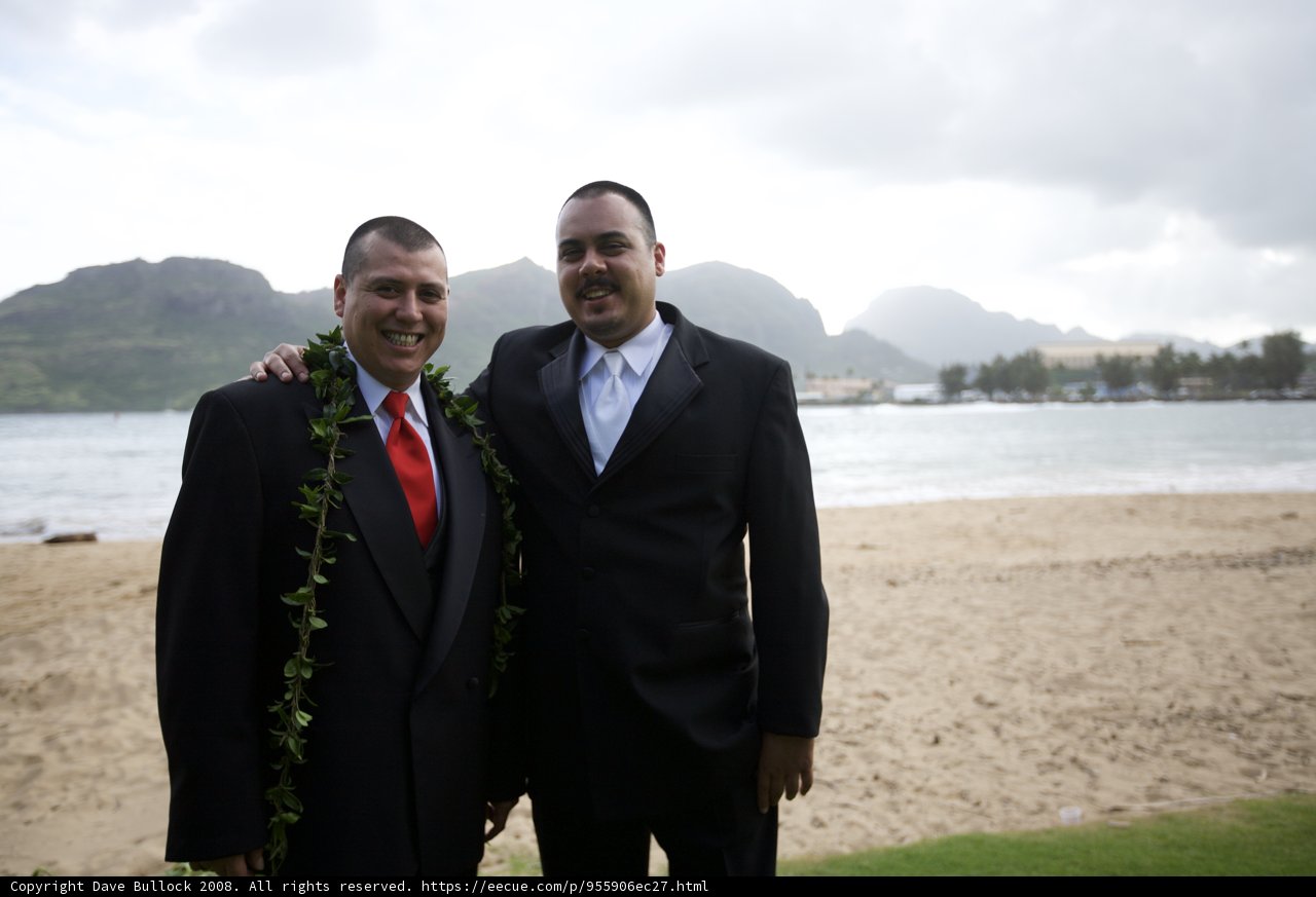 Two Men in Suits Enjoying the Beach View