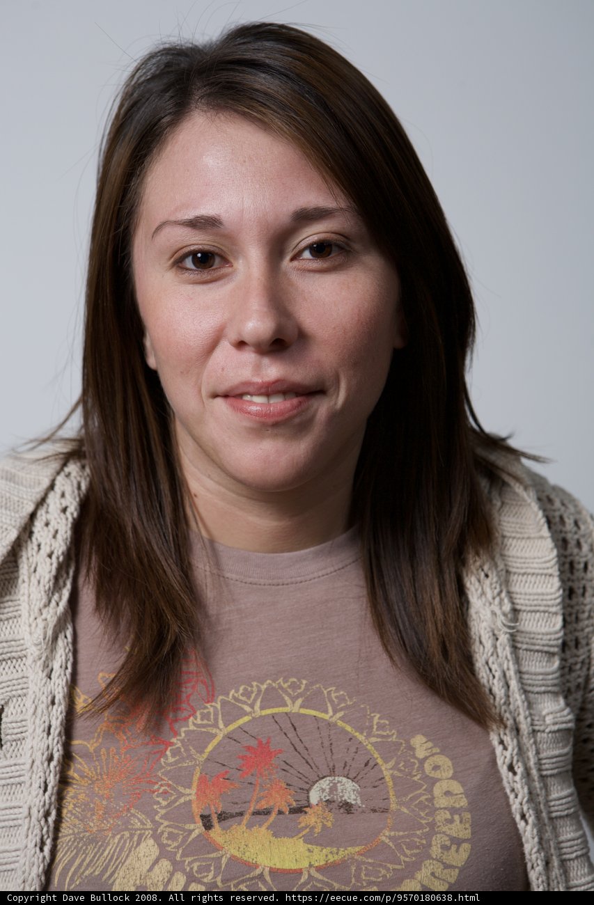 Smiling in Brown Knitwear
