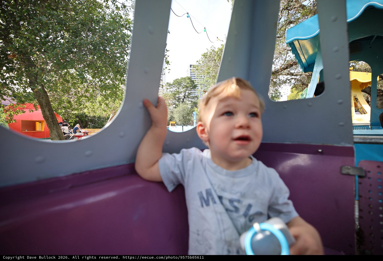 Toddler Playing at Colorful Fantasyland Playground