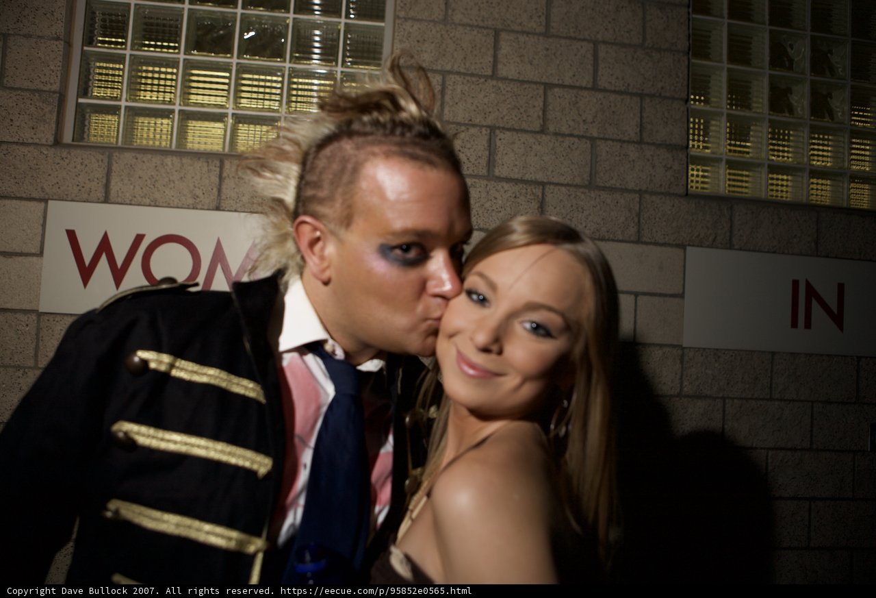 A Romantic Kiss in Formal Wear