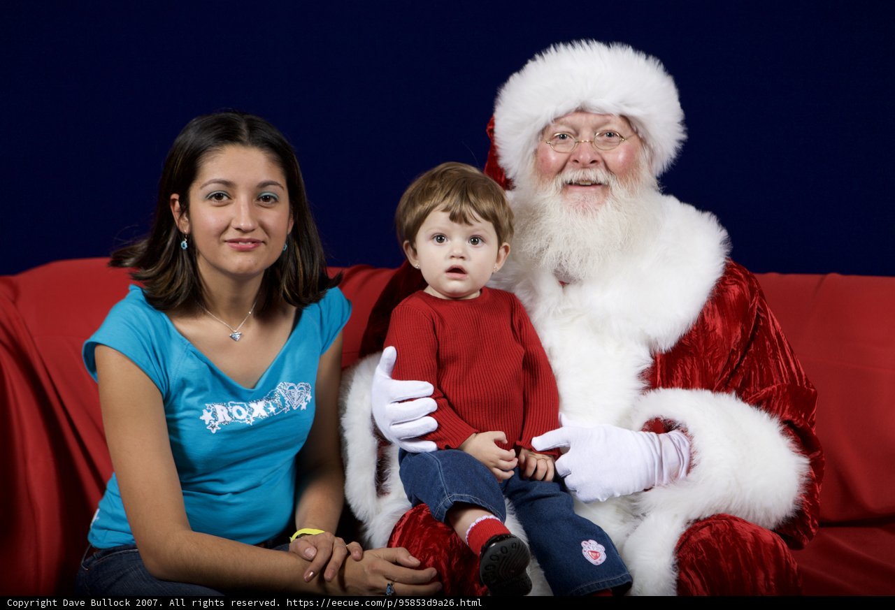 Christmas Cheer with Santa Claus, Woman, and Child