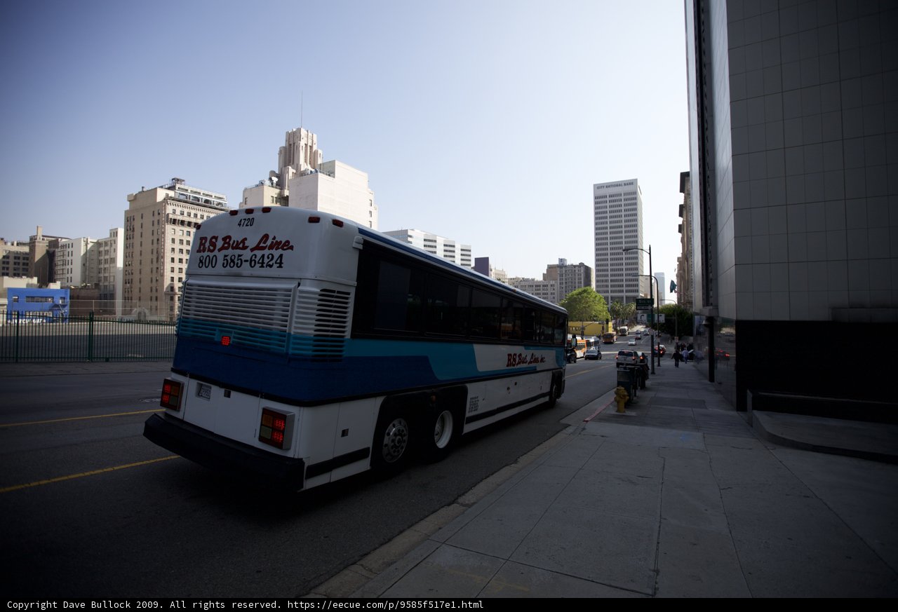 Tour Bus in the Urban Metropolis