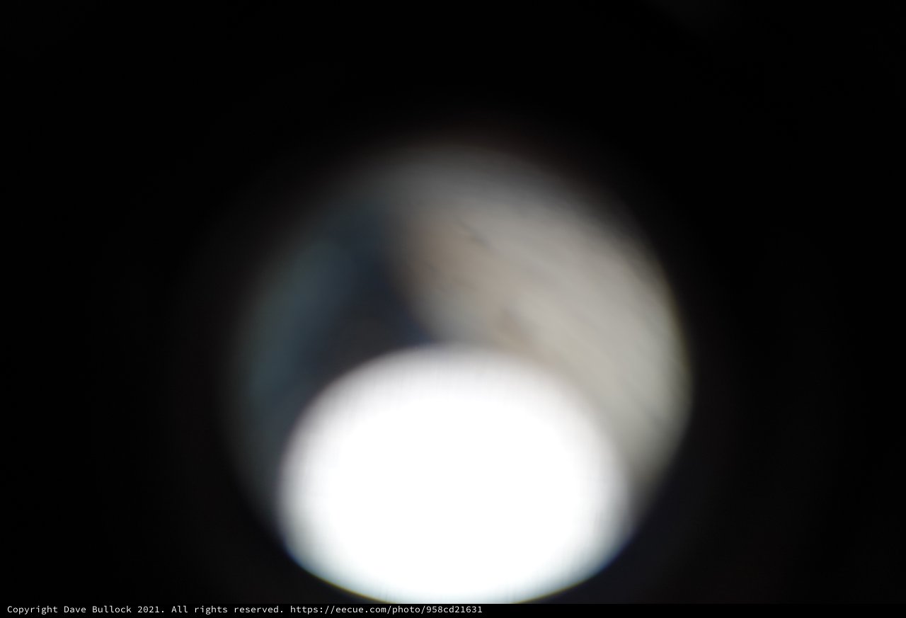 Blurred Double Moon Exposure Against Black Sky