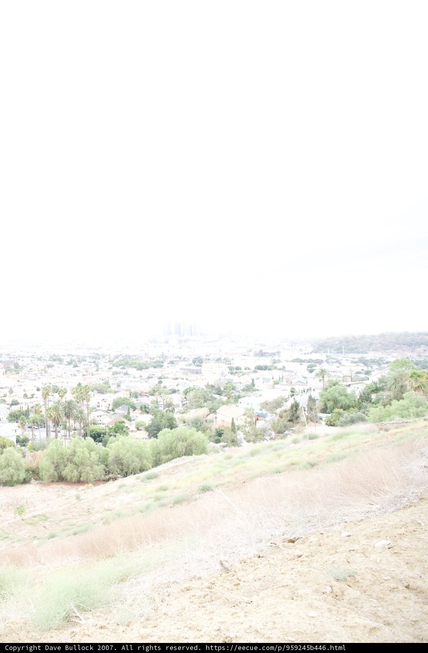 A Man and His Hydrant on Cloudy Hills