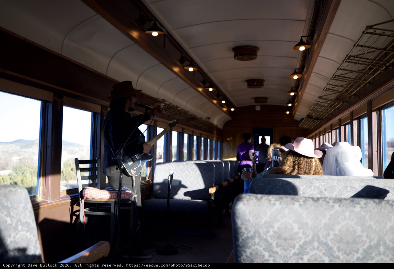 Vintage Train Car Interior with Scenic Mountain Views