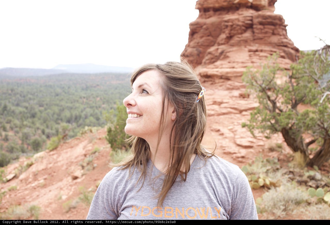 Woman Gazing Upward Among Sedona Red Rock Formations