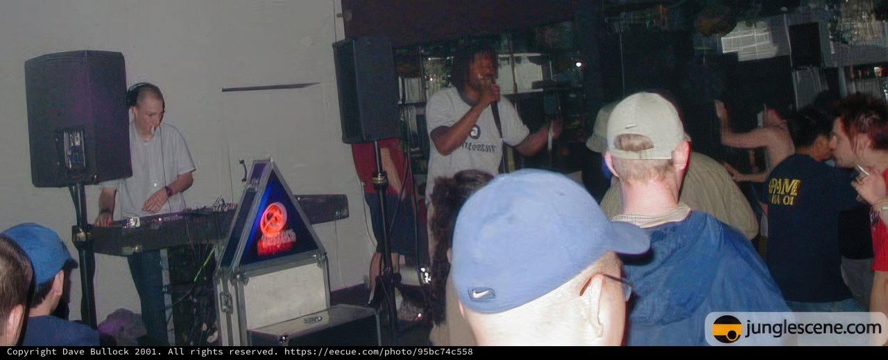 Hat-Wearing Man Enthralls Crowded Music Venue
