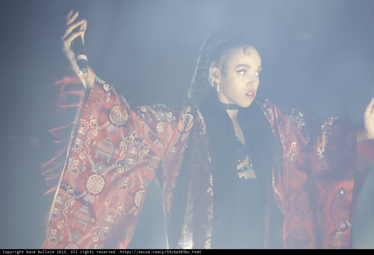 FKA twigs Arm Raised Red Brocade Kimono Black Choker Baby Hairs Hoop Earrings Expressive