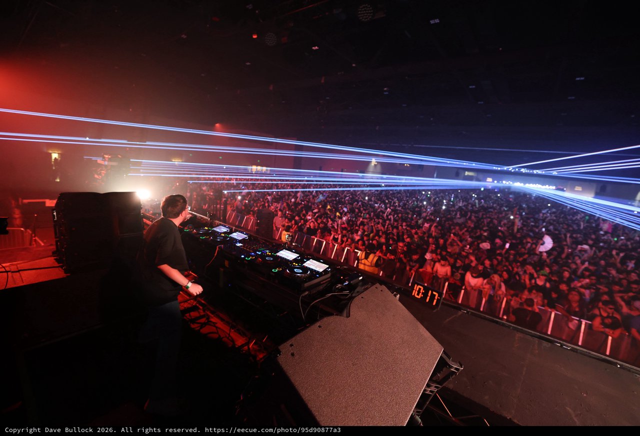 DJ Ignites Massive Crowd with Laser Light Show