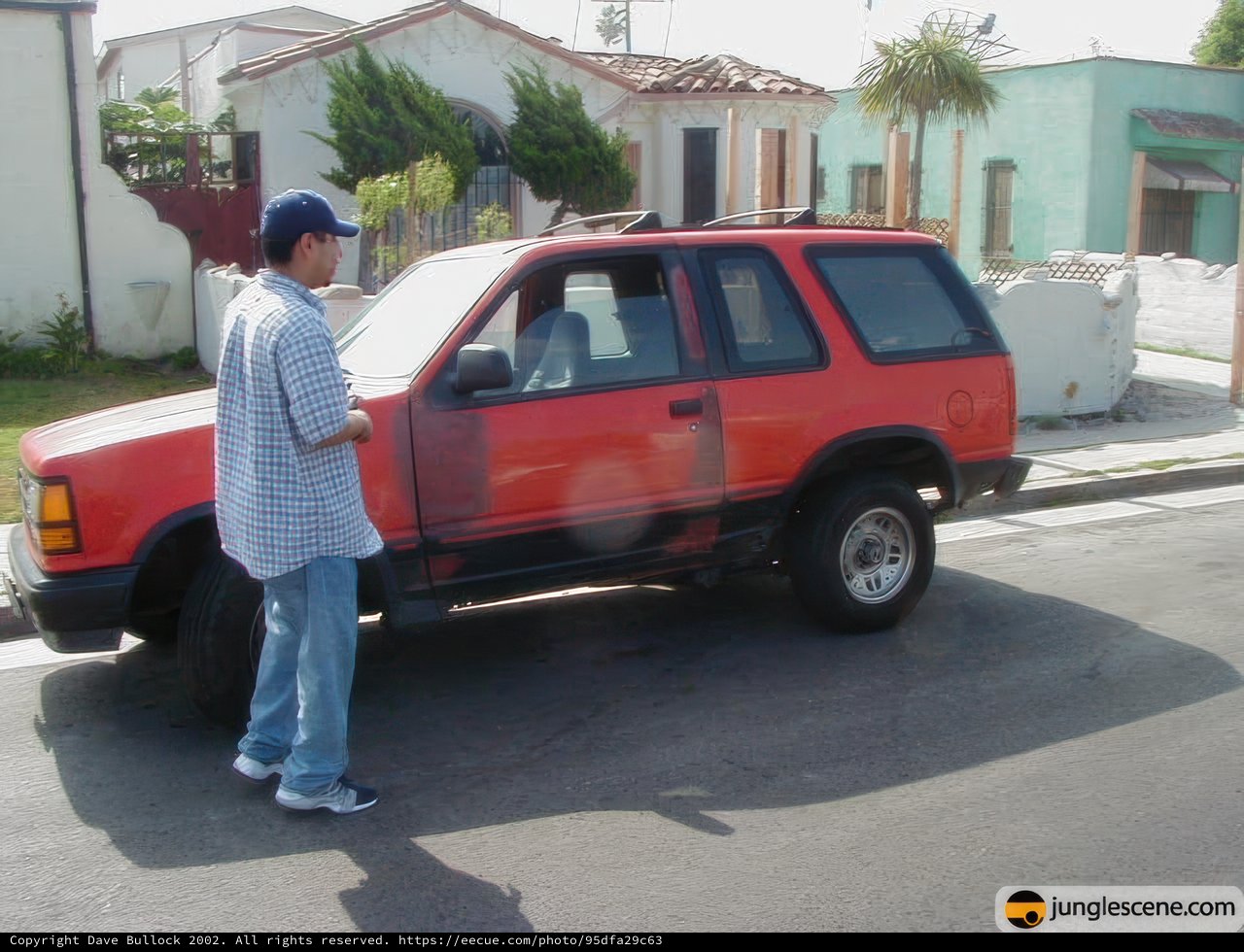 Red SUV and a Man
