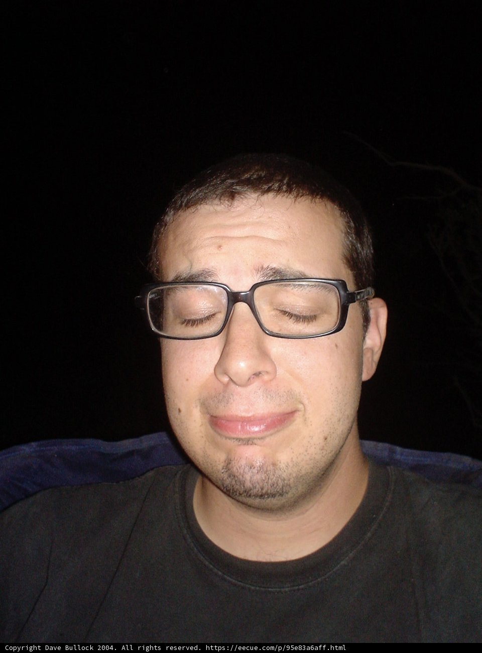 A Happy Man with Glasses