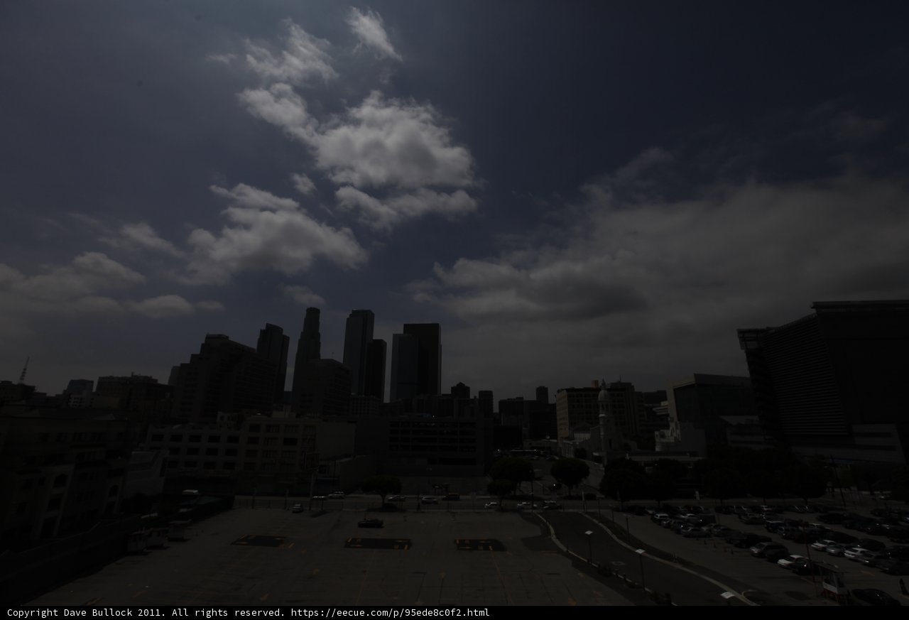 Bright Sun Shimmers over City Skyline