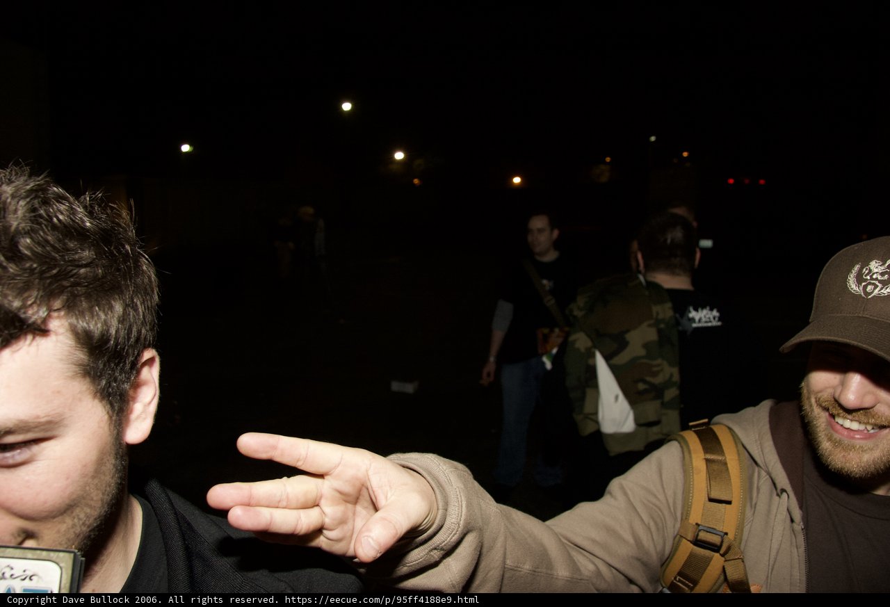 Brown Jacketed Man under the Night Sky