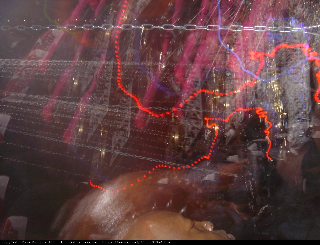 Red Lights on Barbed Wire Fence