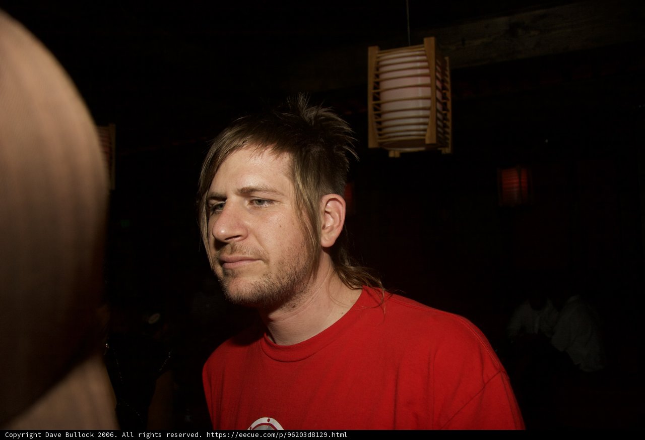 Red-shirted Brian H with Long Hair