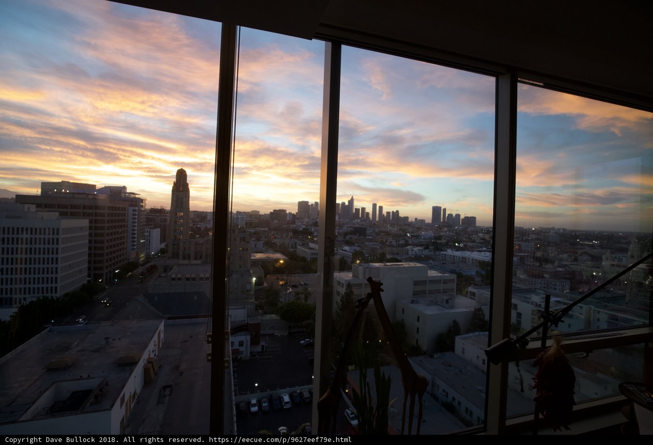 Urban Sunset View from Building Window