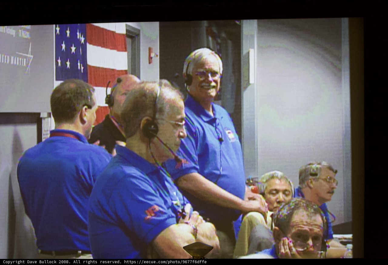 Group of Men in Blue Shirts at Phoenix Touchdown