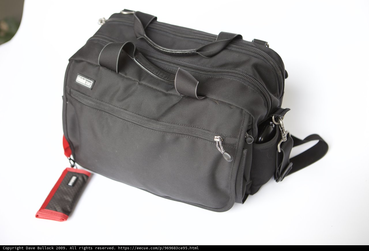 Sleek Black Backpack with Red Tag