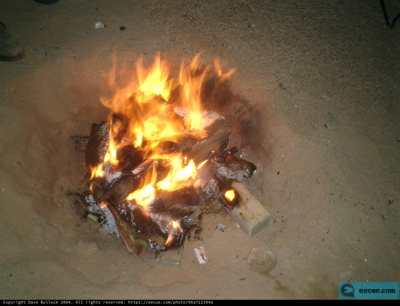 Flames and Embers Dance in the Sand
