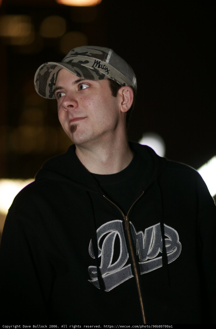 Cole Escola sporting a classic baseball cap
