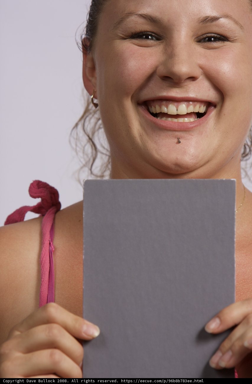 Grinning Girl with Paper
