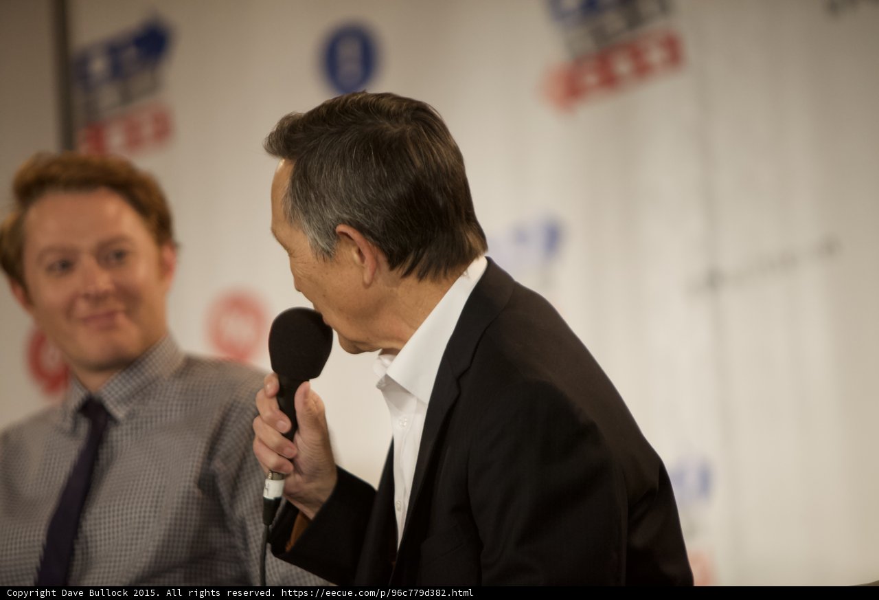 Two Men Deep in Conversation