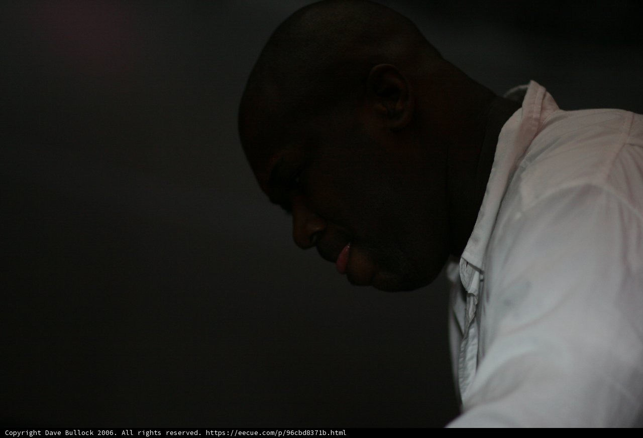 Contemplative White Shirt Man